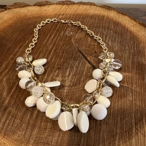 Elegant cream and gold necklace with clear beads